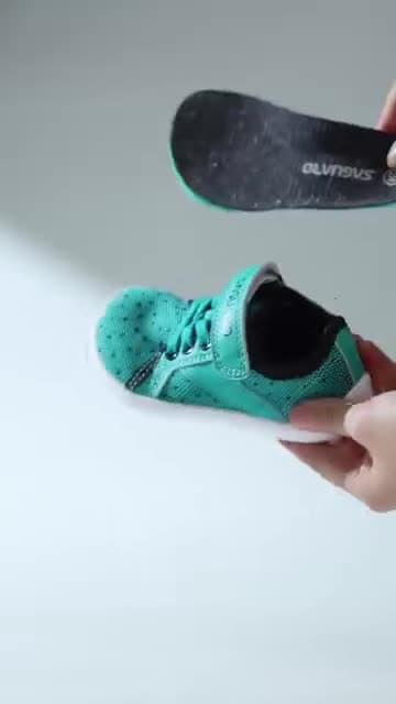 Frame at 0:12 from a Saguaro video ad: insole out