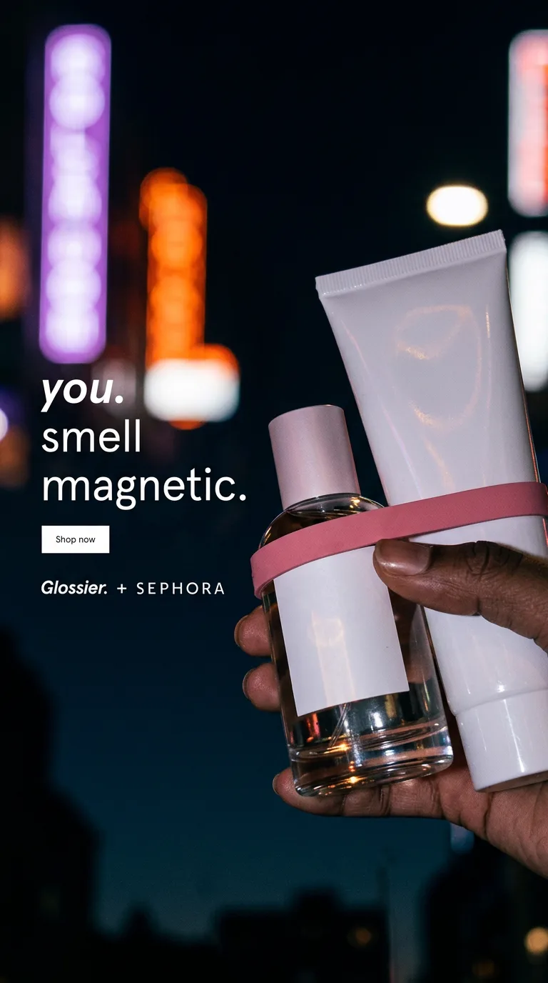 Independent example Studio draft — a night-lit lifestyle still of a hand holding the fragrance and hydrator.